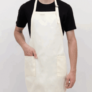 Man wearing a Laviva Sports full length apron with two patch pockets.