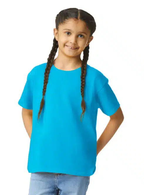 Girl with braided pigtails wearing a bright blue t-shirt