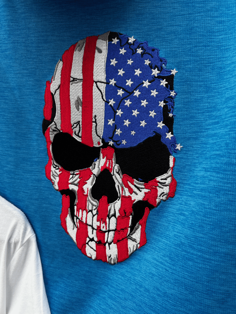 American flag skull embroidery. Custom embroidery design by Crowned Stitches.